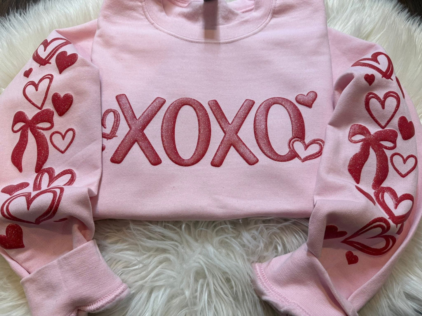 #277a XOXO glitter puff with sleeves